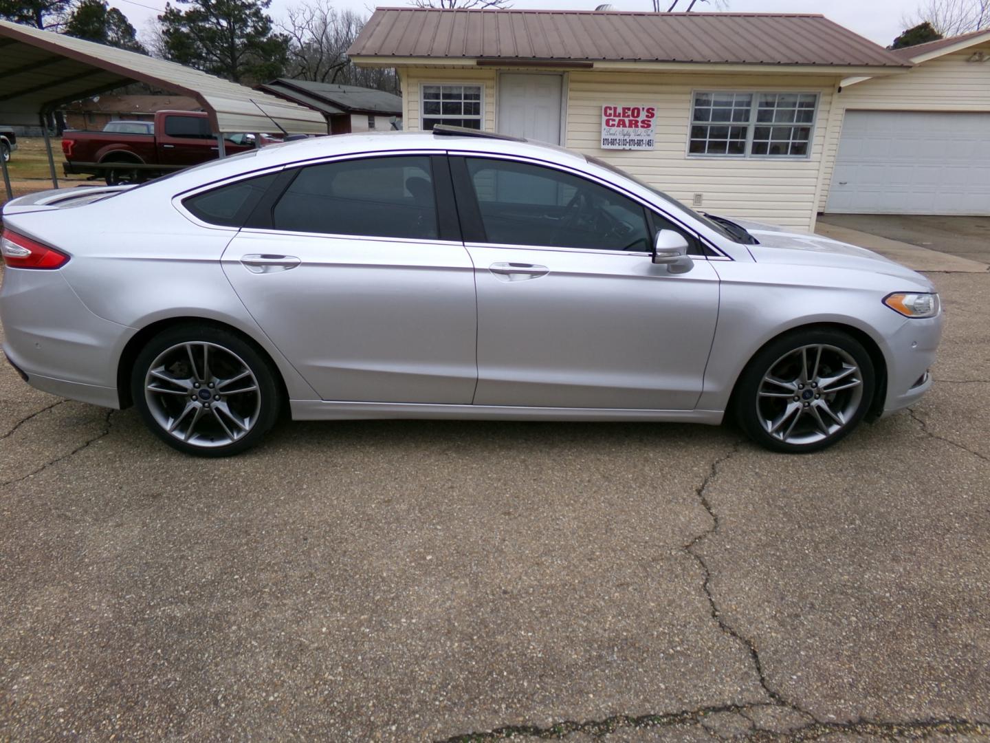 2013 Silver /Black Ford Fusion Titanium (3FA6P0K97DR) with an 2.0L L4 DOHC 16V engine, automatic transmission, located at 401 First NE, Bearden, AR, 71720, (870) 687-3414, 33.726528, -92.611519 - Photo#26